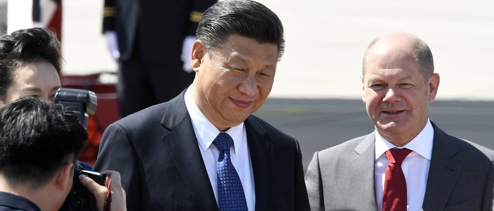 Xi Jinping und Olaf Scholz bei der Ankunft zum 12. G20-Gipfel 2017 auf dem Hamburg Airport. (Archivbild)

