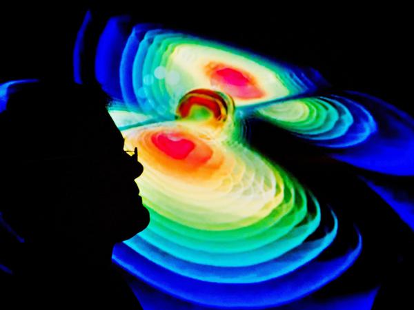In ihren Schwingungen transportieren die Gravitationswellen Botschaften über die Geheimnisse des Universums. Hier ist eine Visualisierung von Gravitationswellen zu sehen.